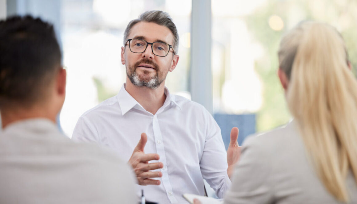 Business meeting, advice and man, accountant or manager b2b planning, client talking or finance consulting. Helping, support or advice of financial advisor, accounting ceo or senior person interview